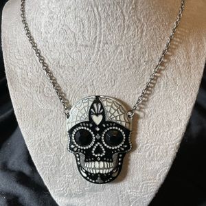 Skull necklace with black white and silver